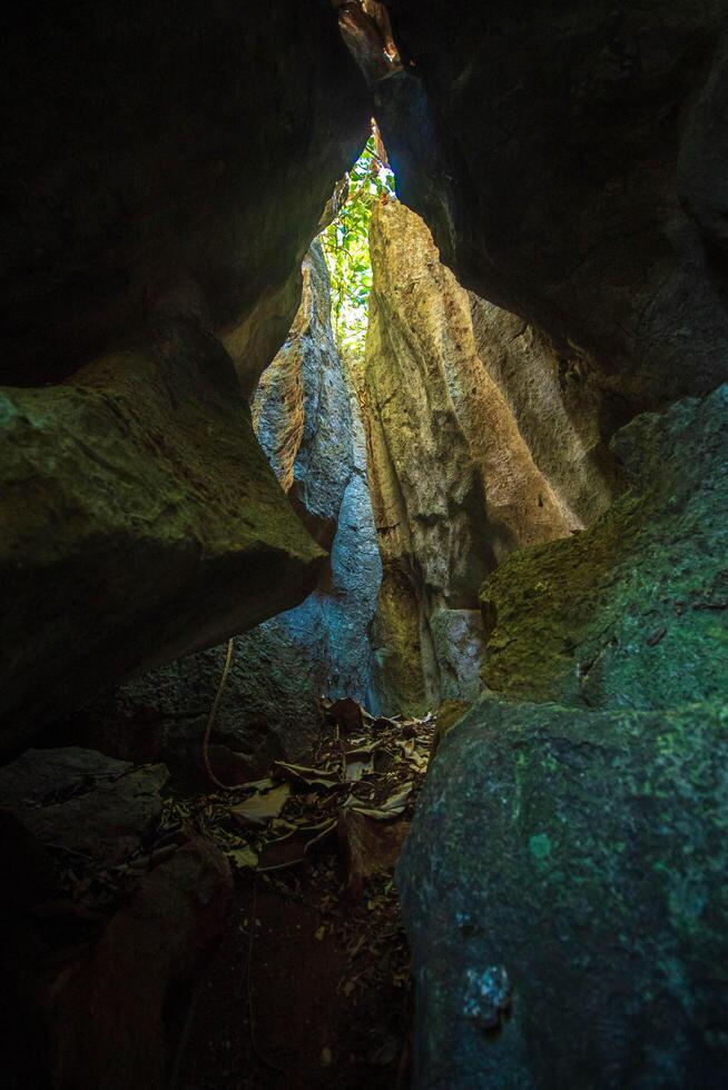 The contrast between light and darkness in the rock crevices. photo