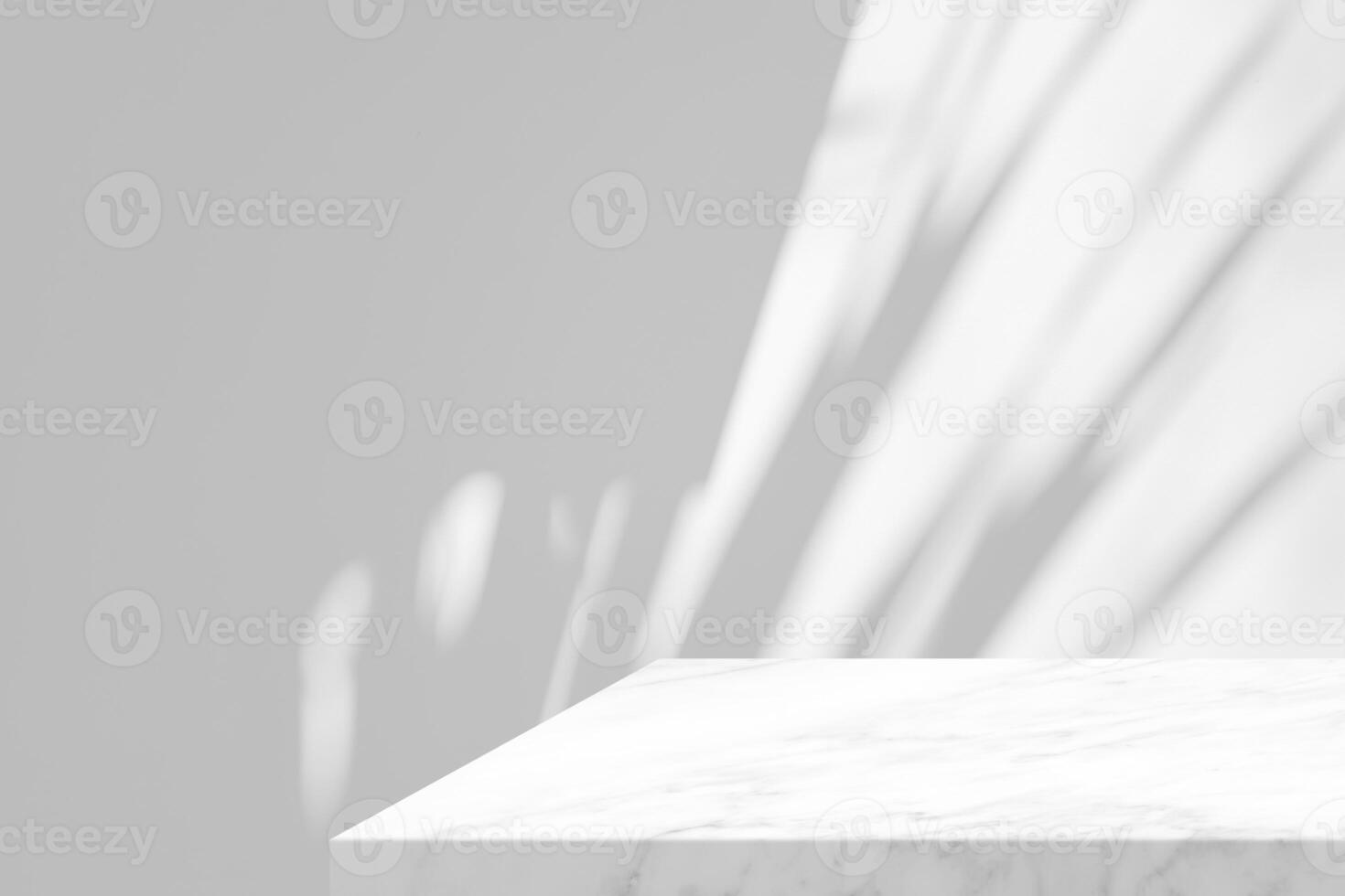 Minimal white marble table corner with shadow and light beam on concrete wall background photo