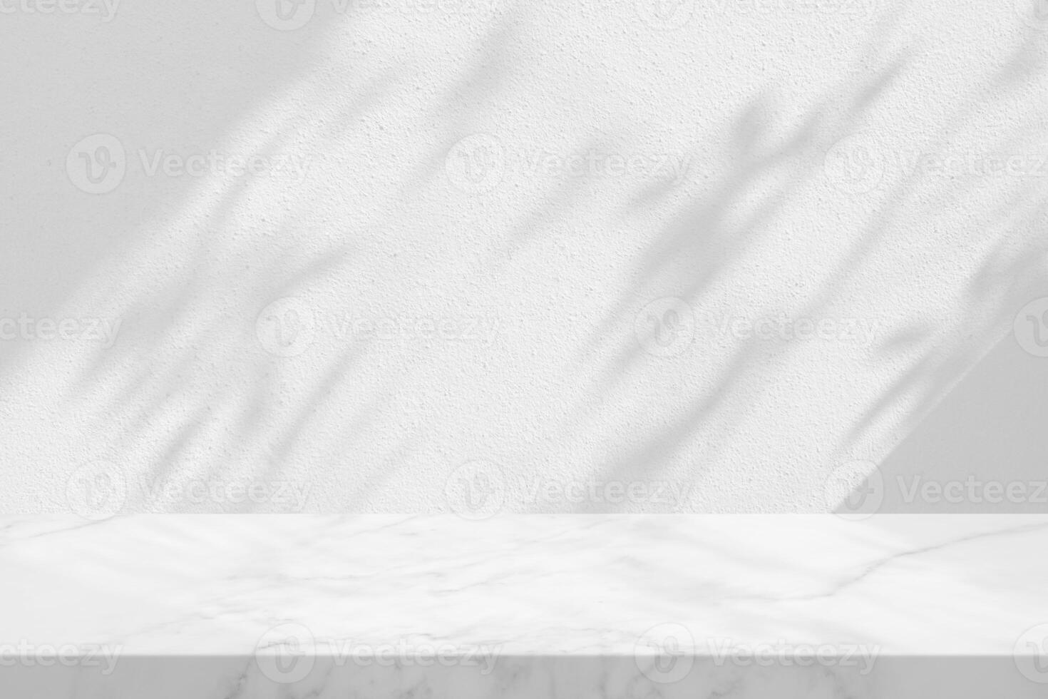 White Marble Table with Tree Shadow on Concrete Wall Texture Background photo