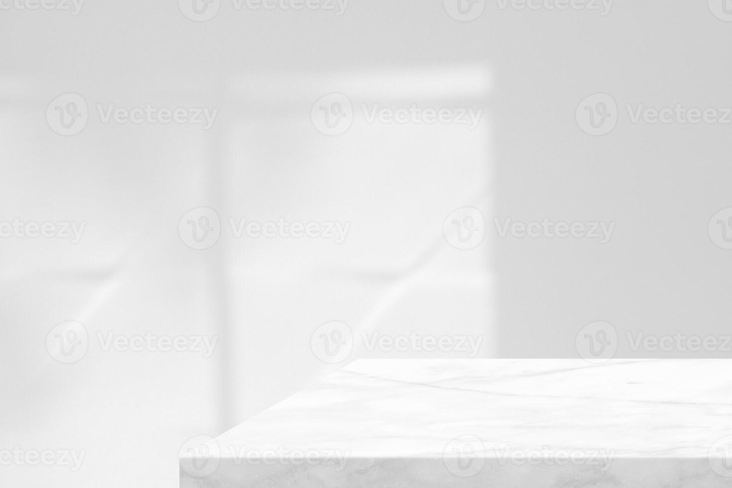 Marble table with white stucco wall texture background with light beam and shadow photo