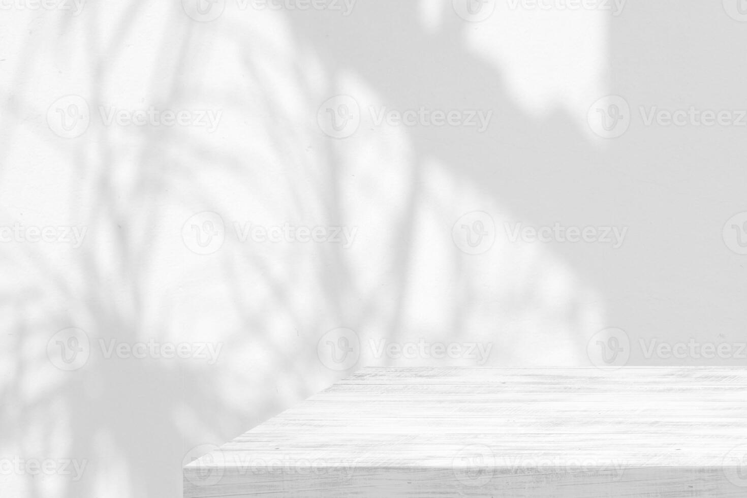 White wood table with shadow and light in the glass house on concrete wall background photo