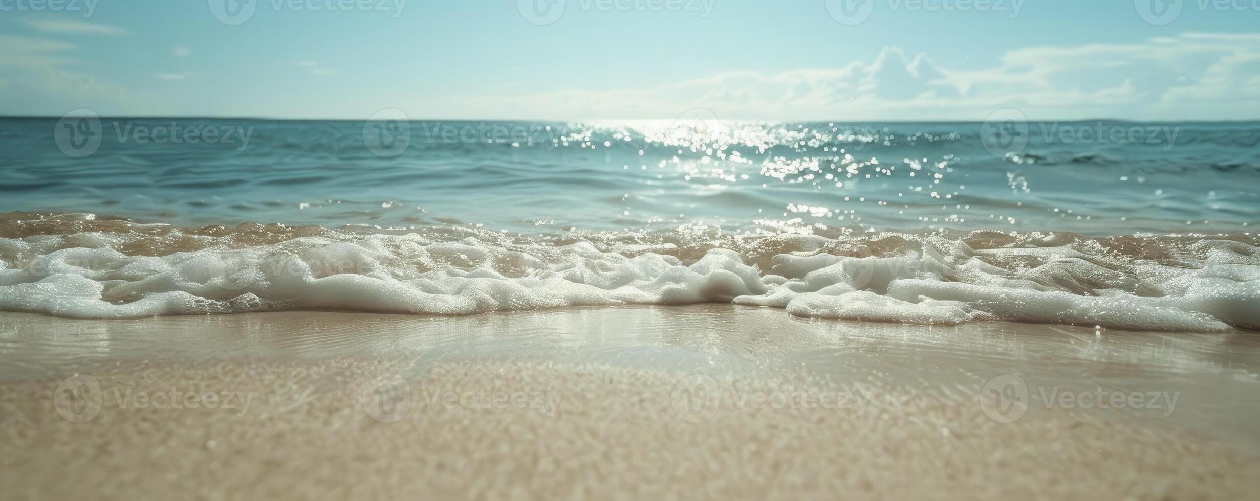 Sand, ocean, and sky photo