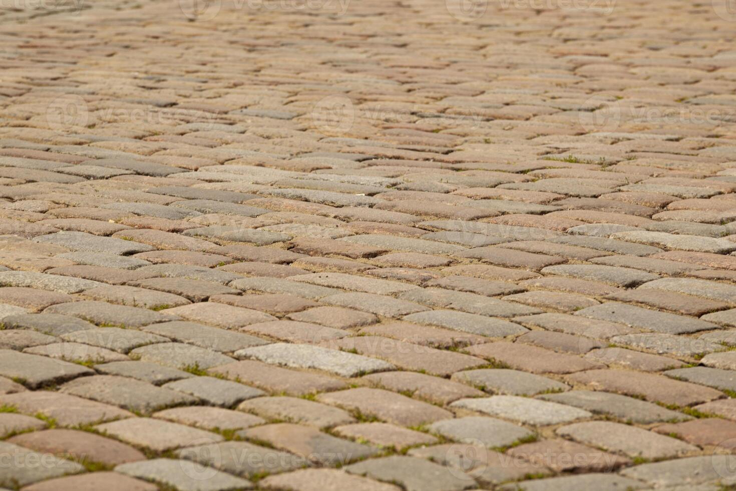 Street pavement texture in tiles. Grey rectangular old tiles. For text. Background. Horizontal. photo