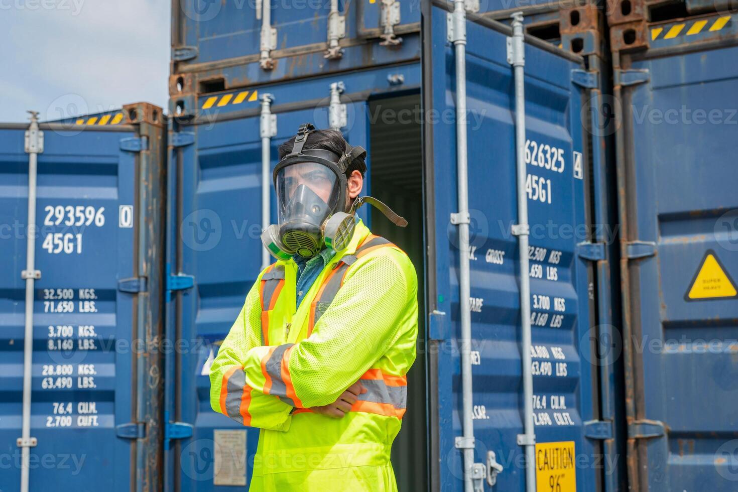 Engineer wear PPE urgently assisted the male technique inside container as Chemical spill in the container shipping industry photo