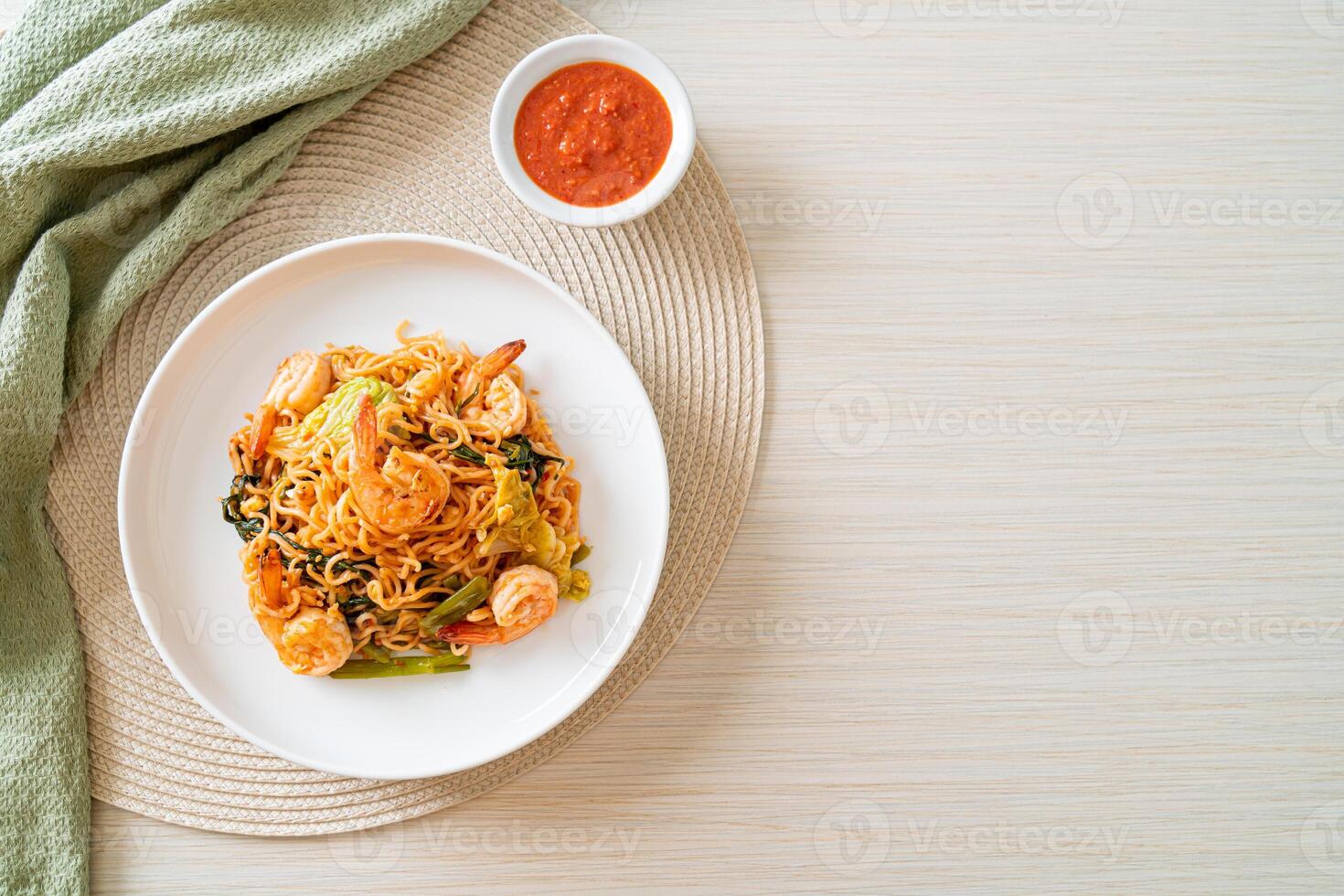 Stir-fried instant noodles sukiyaki with shrimps photo