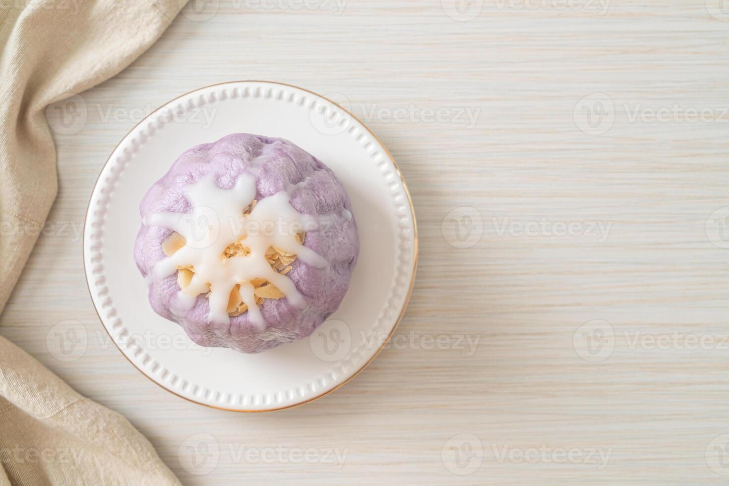 taro bun with white sugar cream and nut photo