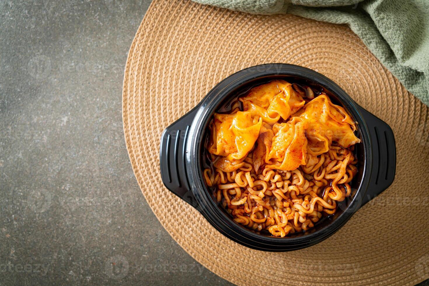 Korean instant noodles with dumplings photo