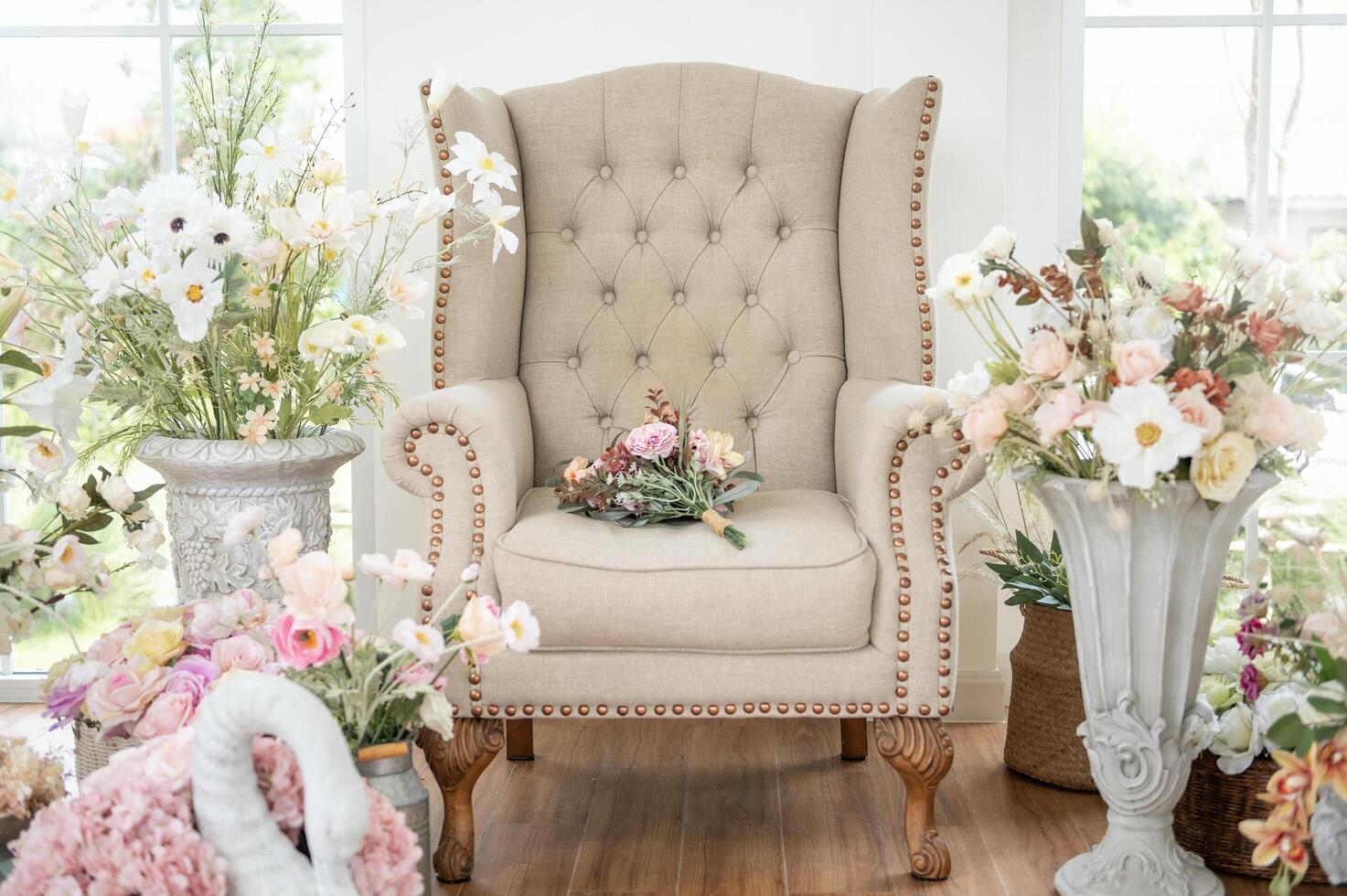 Interior of armchair decorated with Beautiful flowers for wedding ceremony. photo