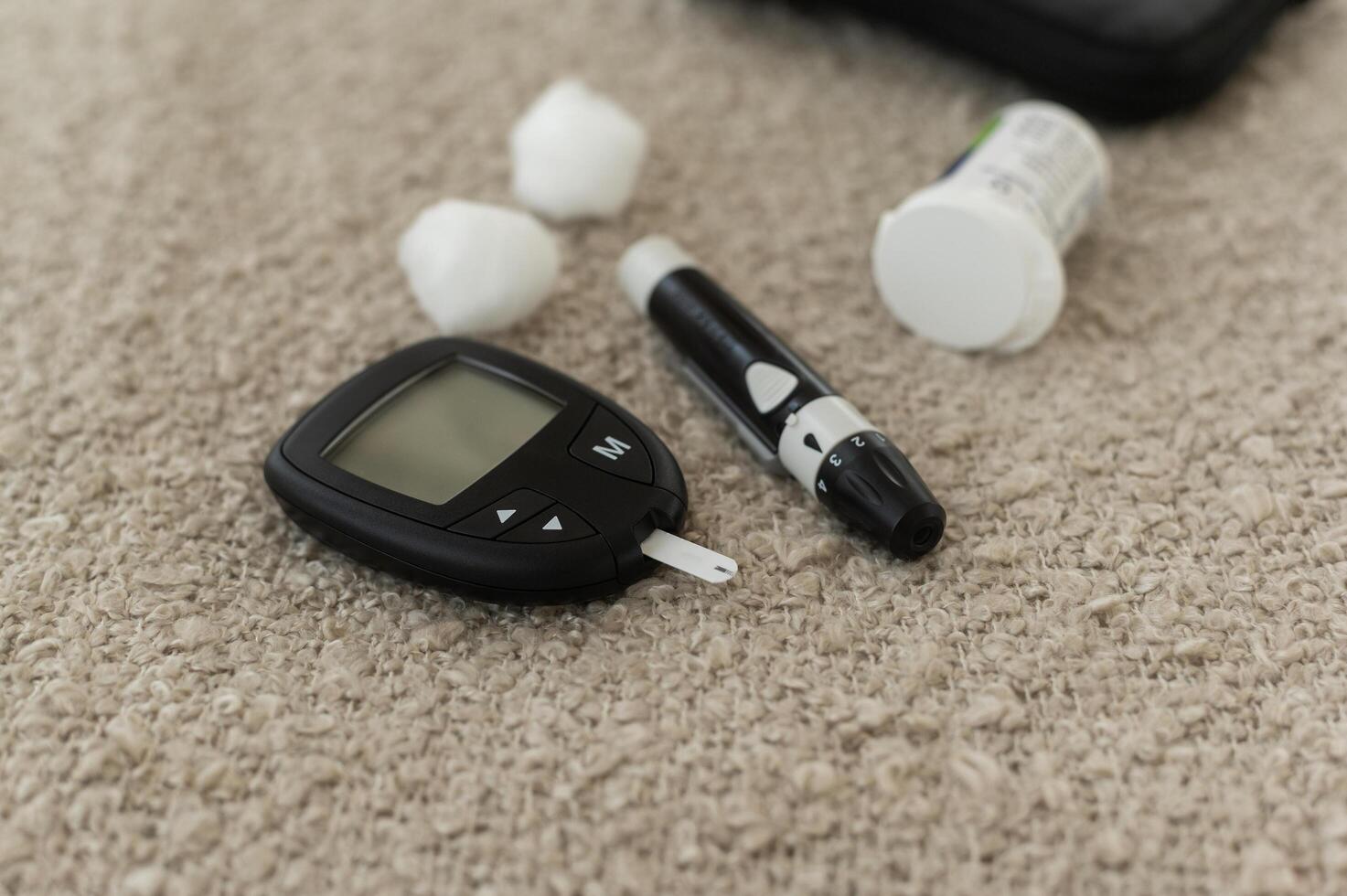 Background of Digital Glucose meter kit for checking blood sugar level, health care, medicine, diabetes, glycemia concept photo