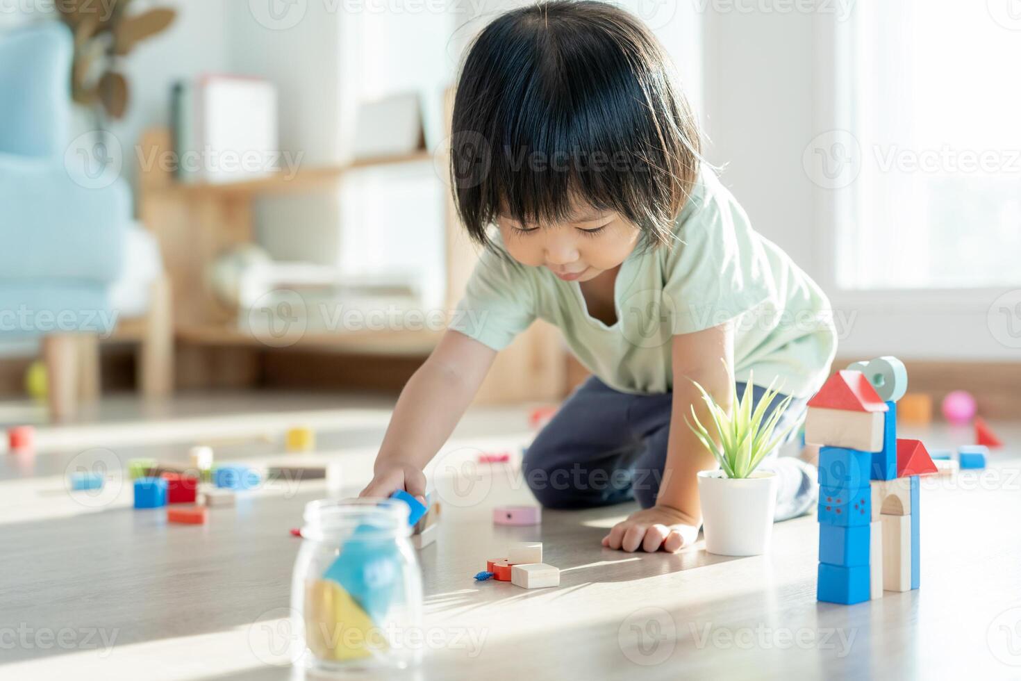 Happy Asia children play and learn toy blocks.family is happy and excited in the house. daughter having fun spending time, Activity, development, IQ, EQ, meditation, brain, muscles, essential skills. photo
