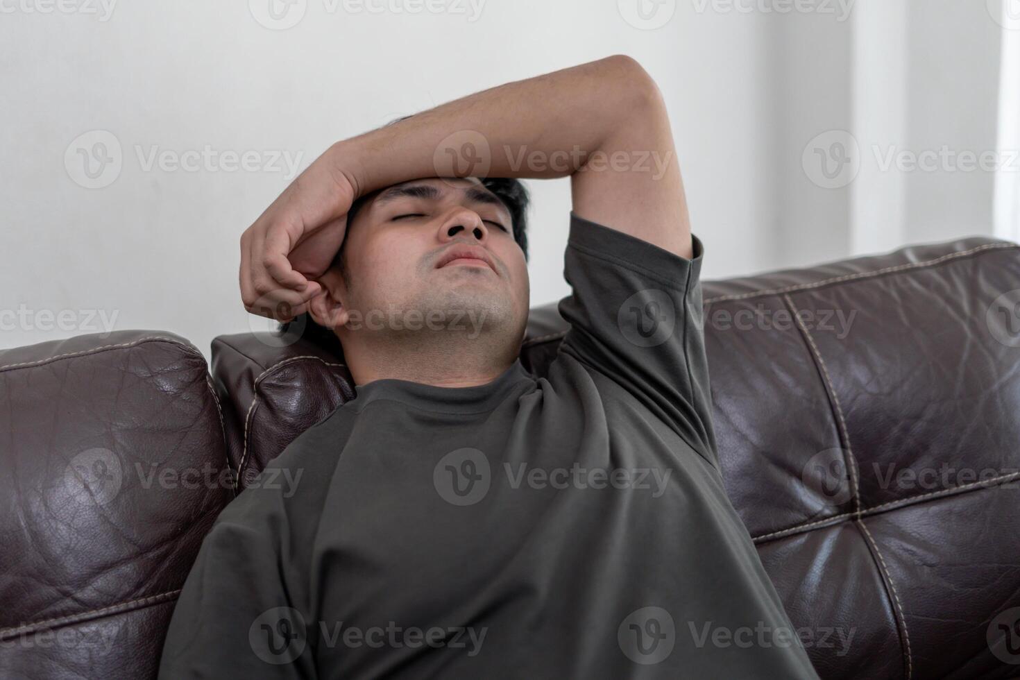 Depression and mental illness. Asian man disappoint, sad after receive bad news. Stressed boy confused with unhappy problem, arguing with girlfriend, cry and worry about unexpected work, down economy. photo