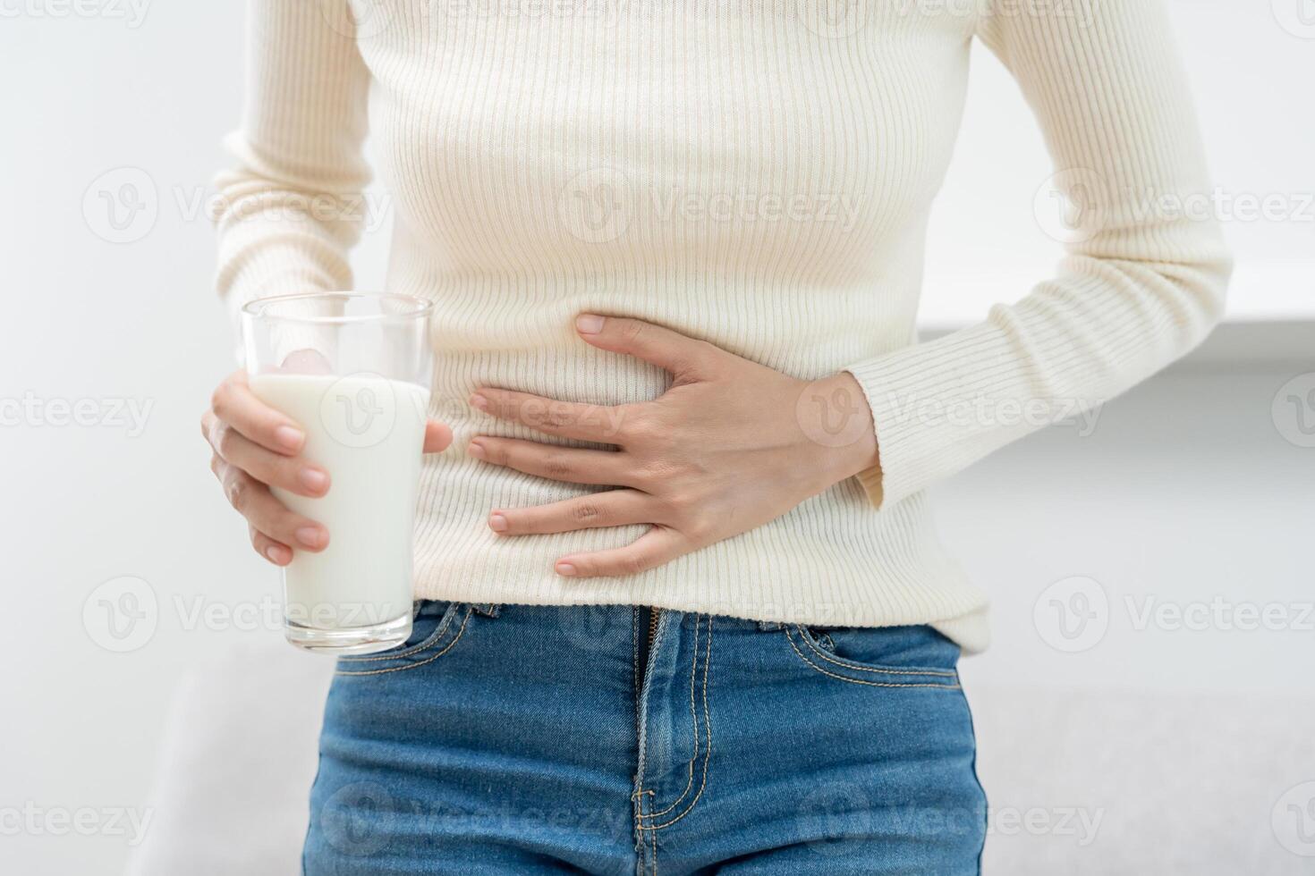 Milk allergens, Sick sad unhealthy, woman confuse drink milk, runny stuffy sore nose suffer from intolerance allergy trigger symptoms. abdominal pain, allergens, protein, rash, death, food allergy photo