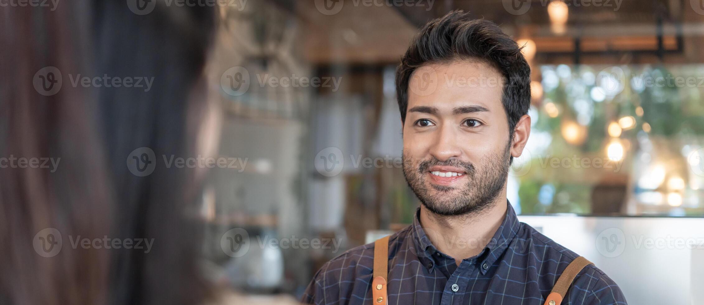 Asia man owner happy smile and send order to customer. guarantees safety, cleanliness, open the coffee shop. open for New normal. Small business, welcome, restaurant, home made, cafe photo