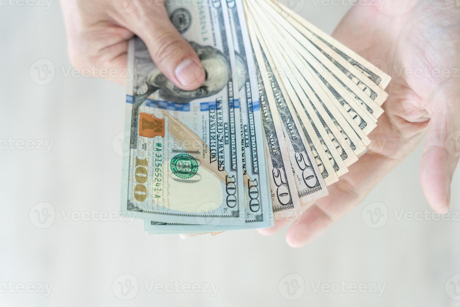 USD currency , Many dollar bank notes Placed on the table.The Dollar is the currency of USA that is used to change, buy, sell, accumulate, and invest in united kingdom's state people. photo