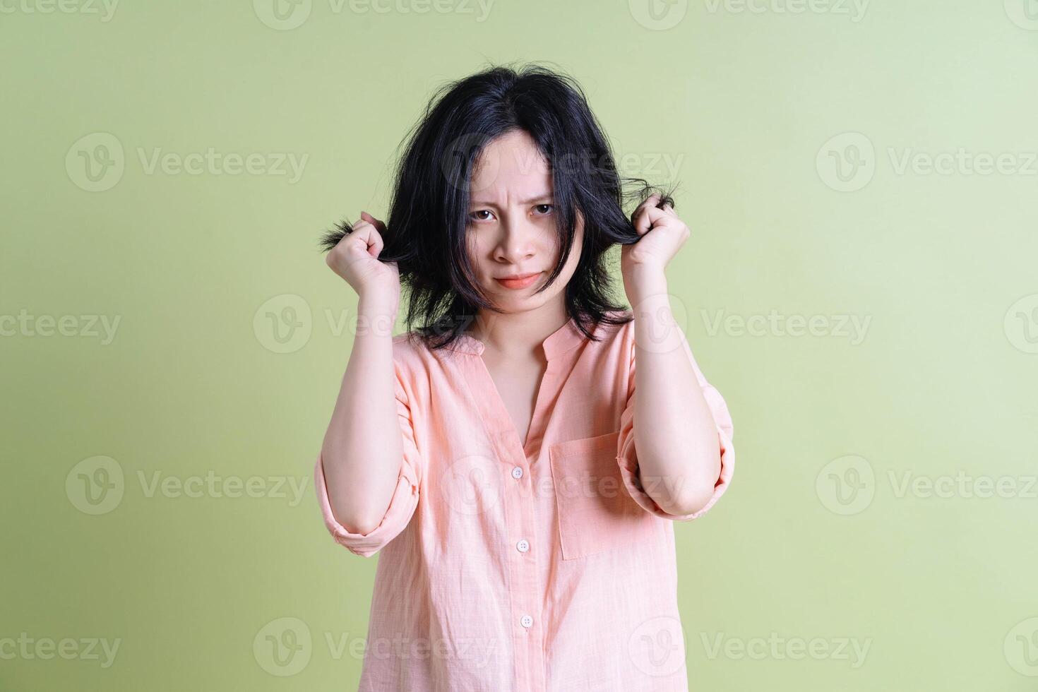 Photo of young Asian woman on background