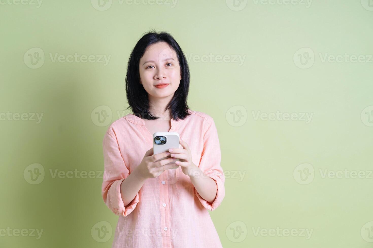 Photo of young Asian woman on background