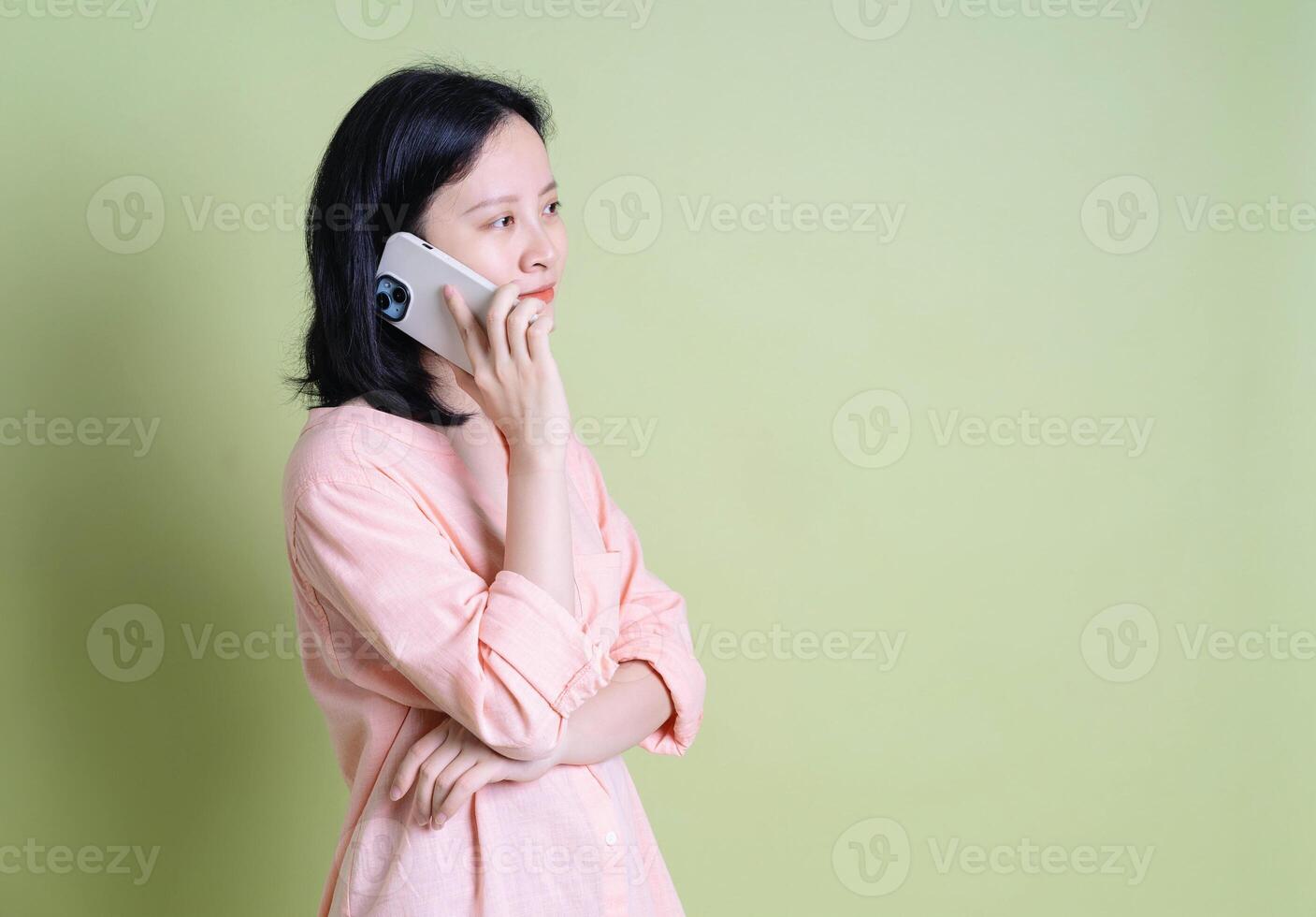 Photo of young Asian woman on background