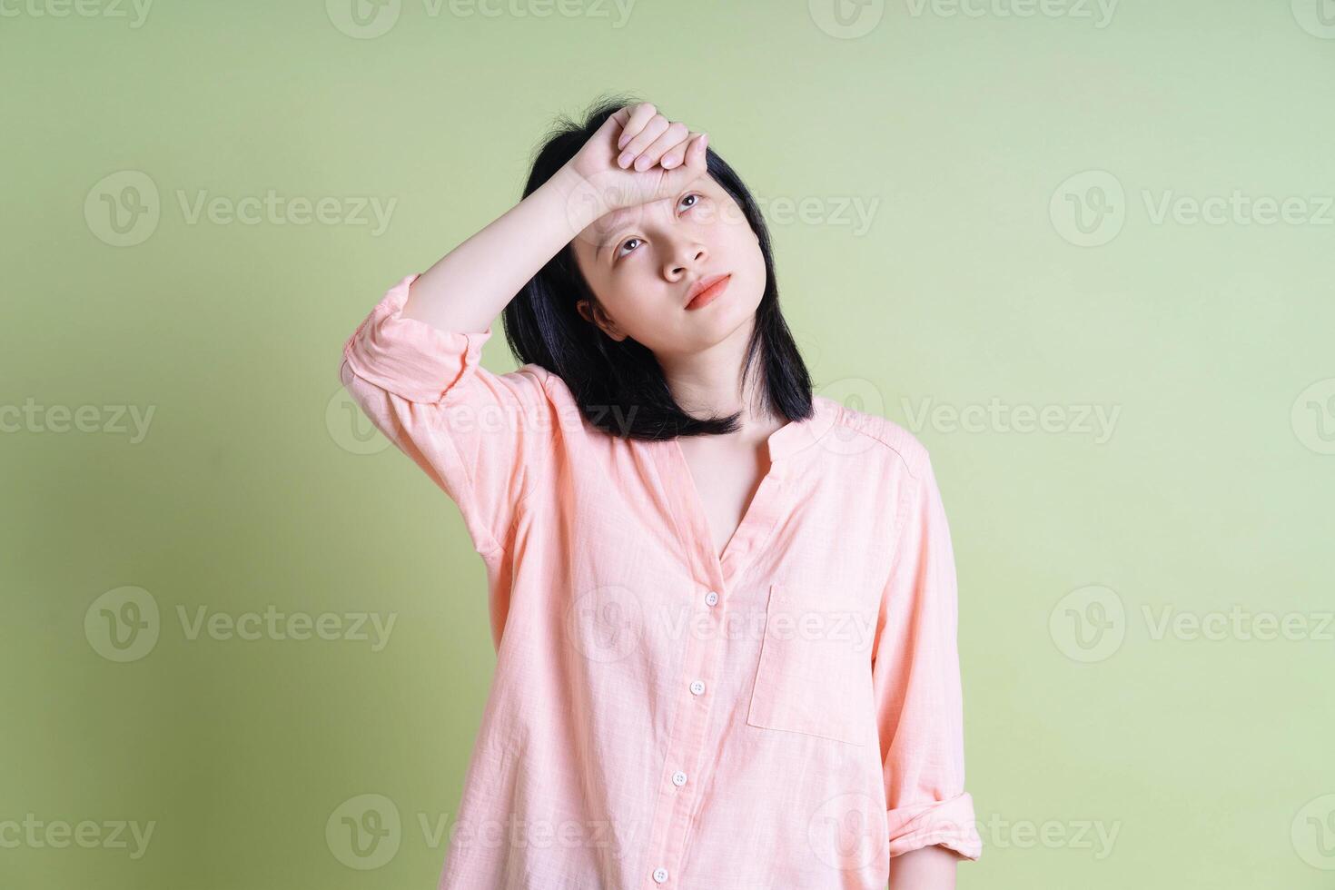 Photo of young Asian woman on background