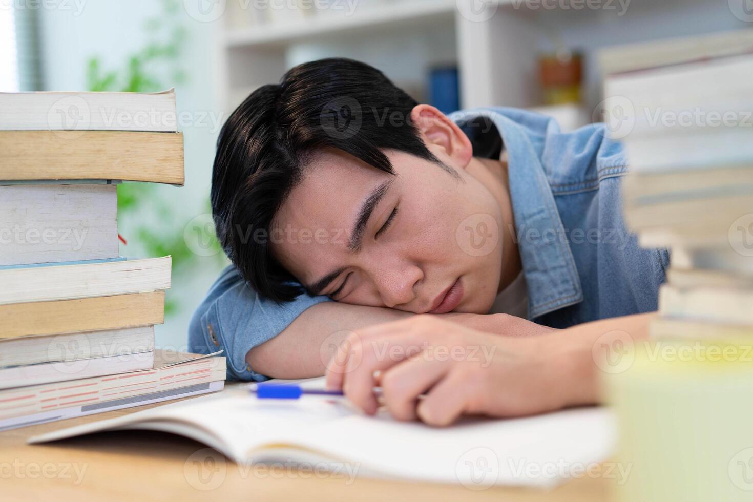 Young Asian businessman working at home photo