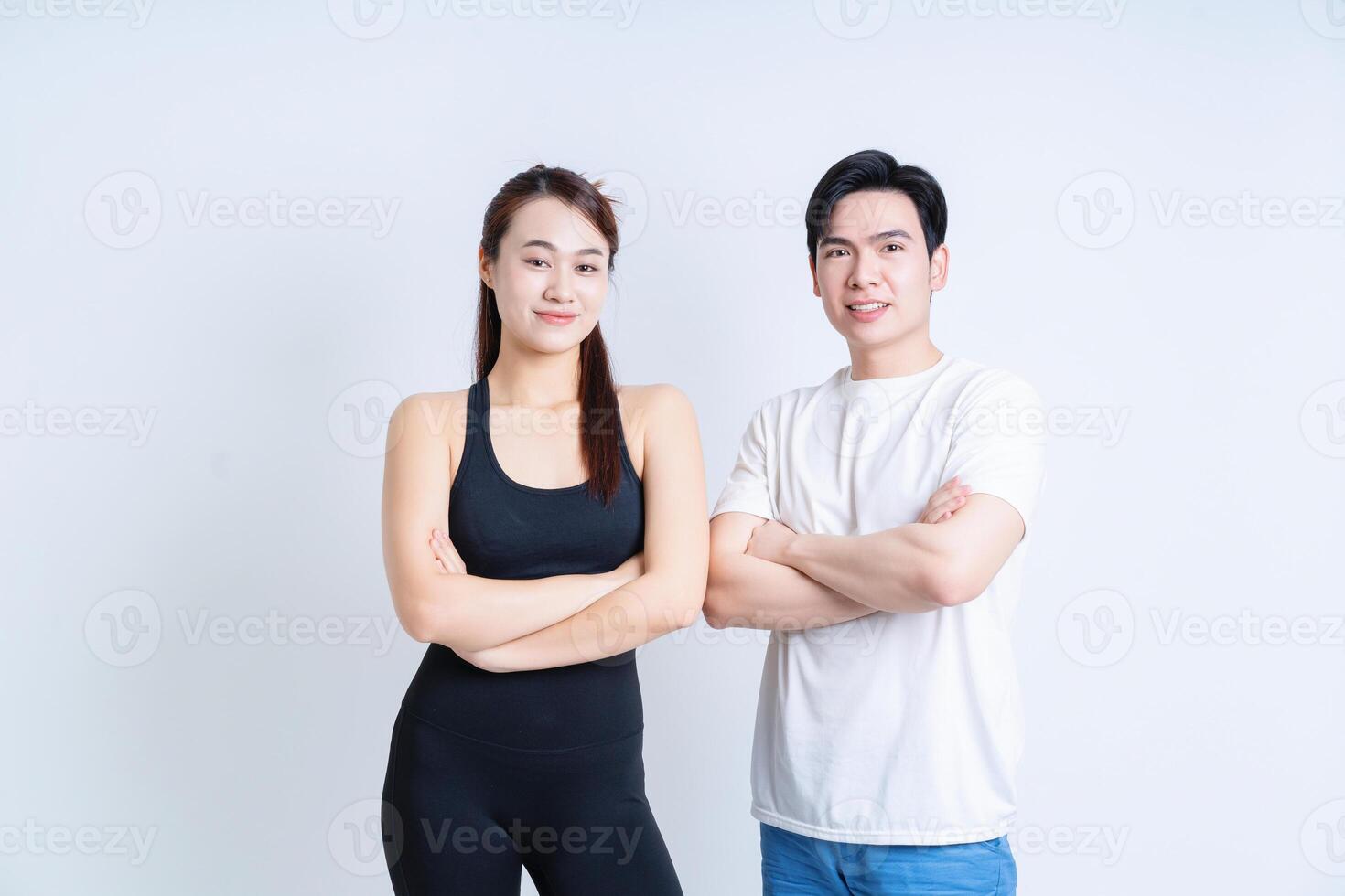Young Asian couple on background photo