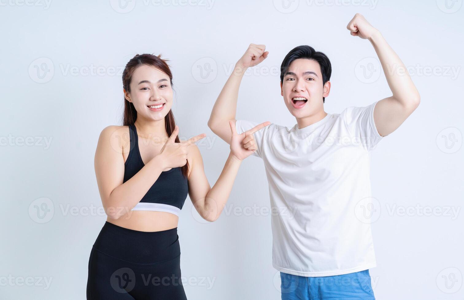 Young Asian couple on background photo