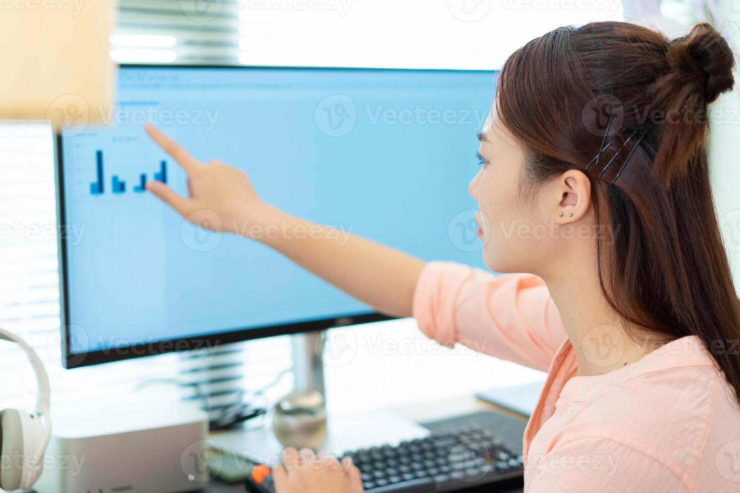 Young Asian woman at home photo