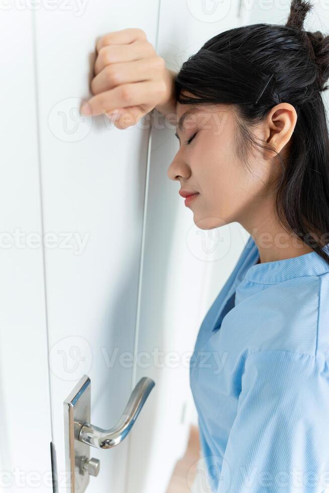 Young Asian woman at home photo