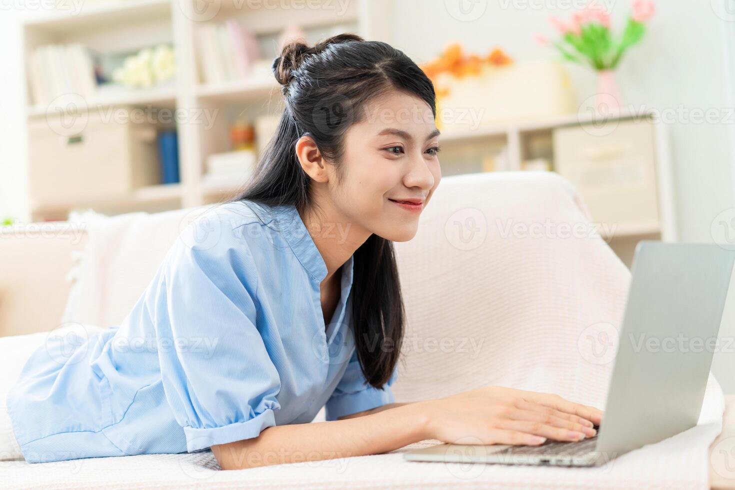 Photo of young Asian girl at home