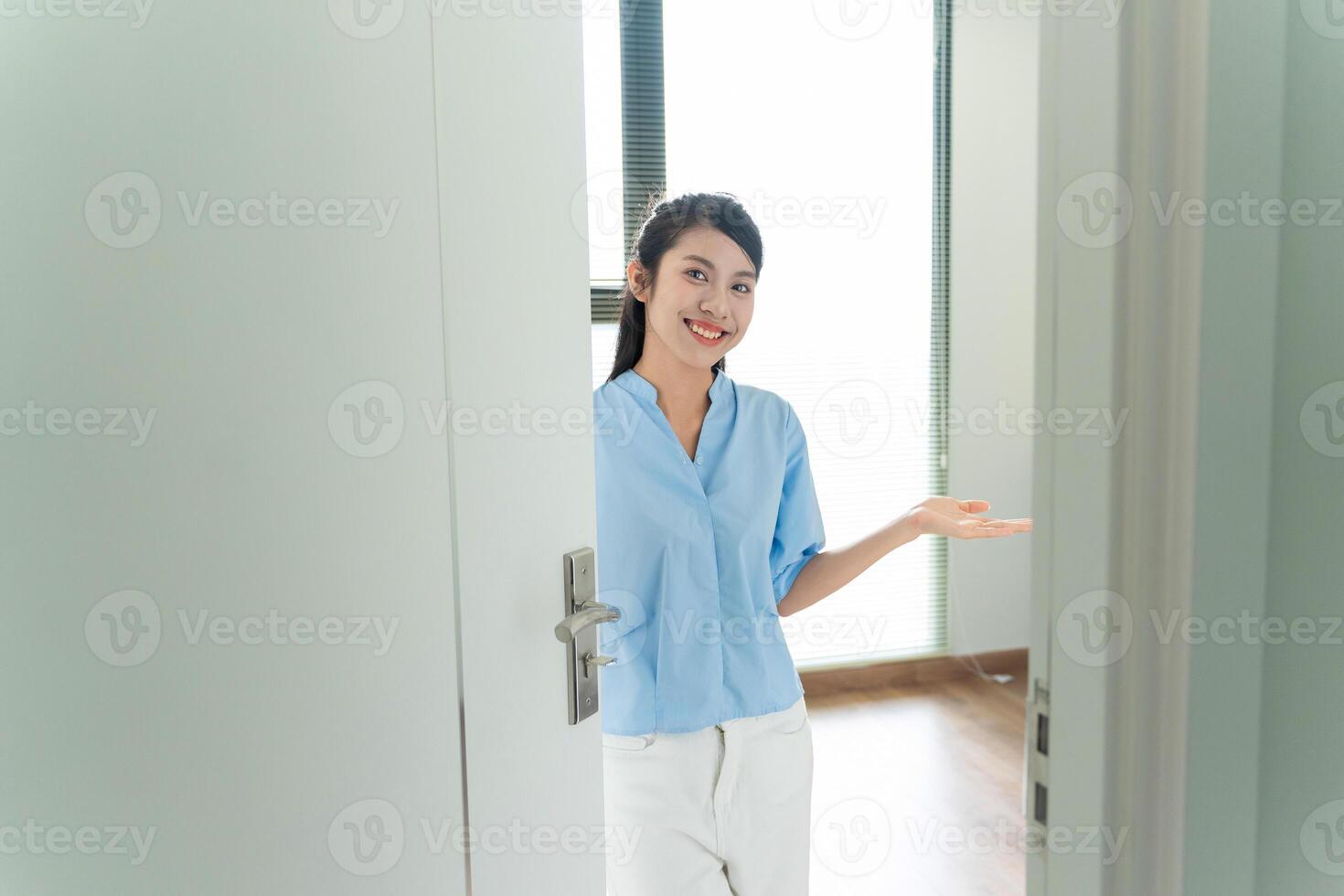 Young Asian woman at home photo