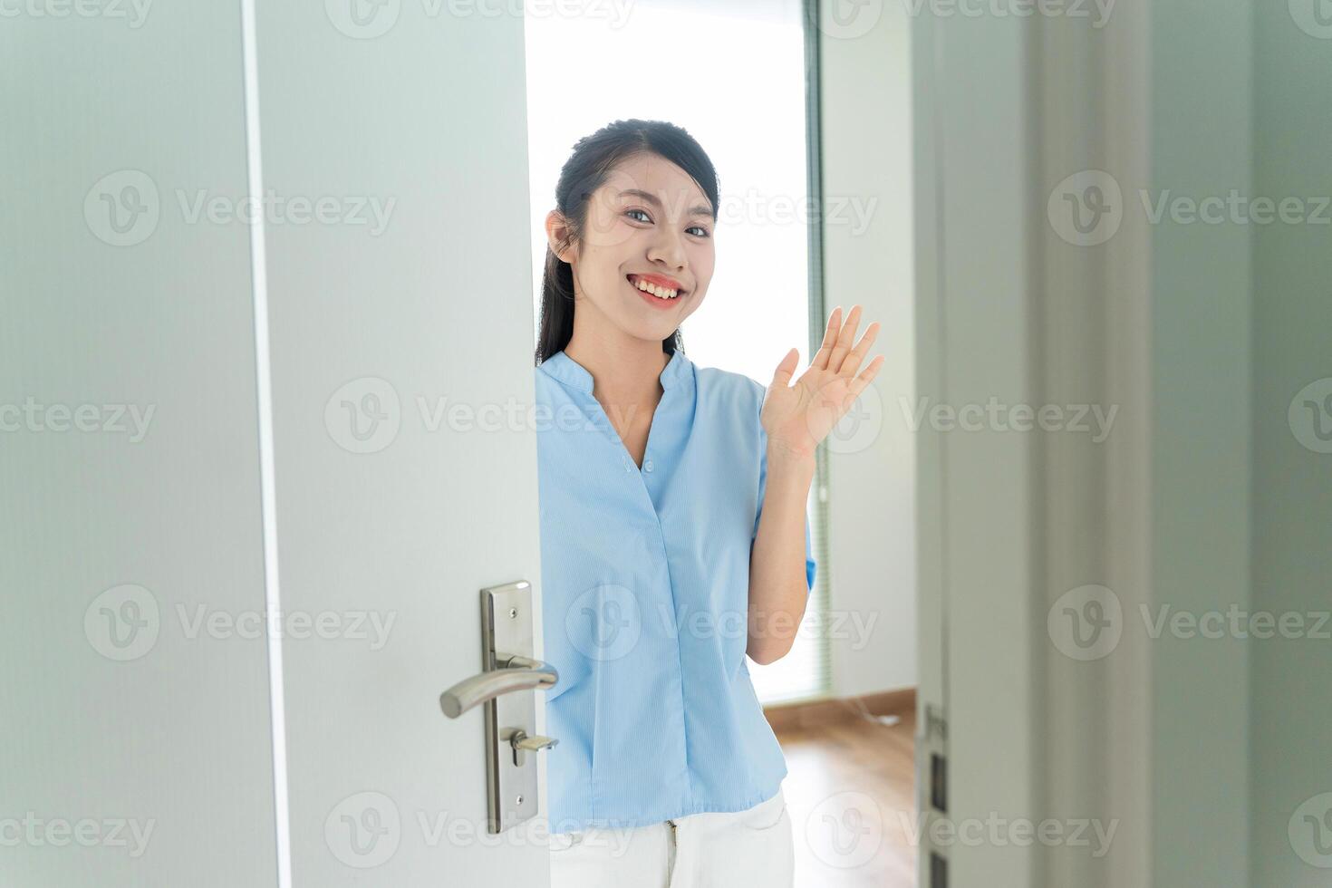 Young Asian woman at home photo