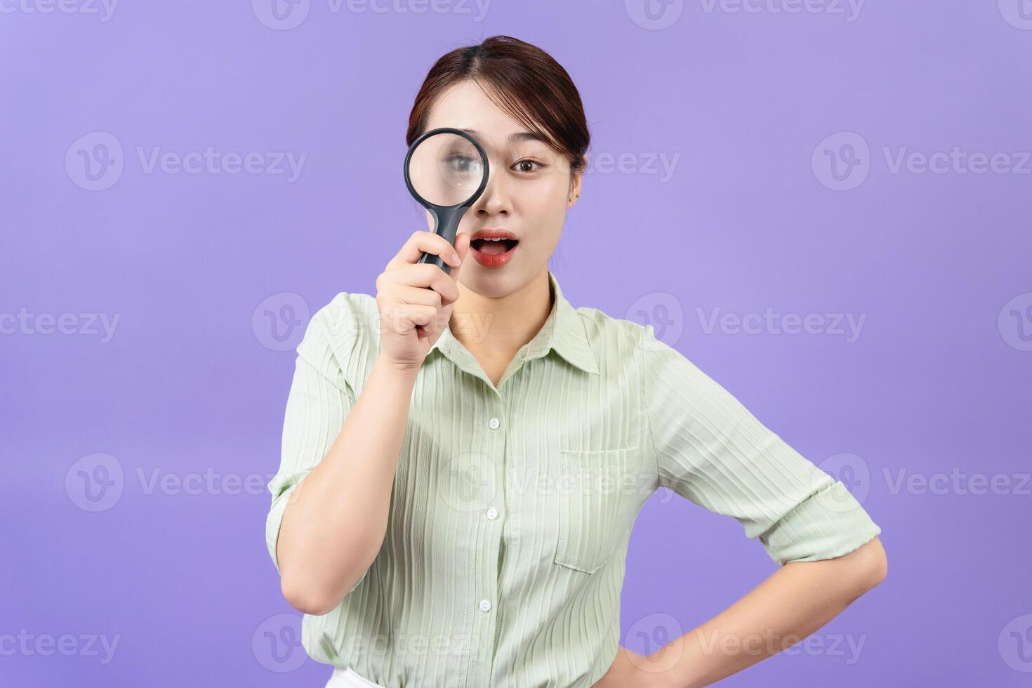 Photo of young Asian woman on purple background