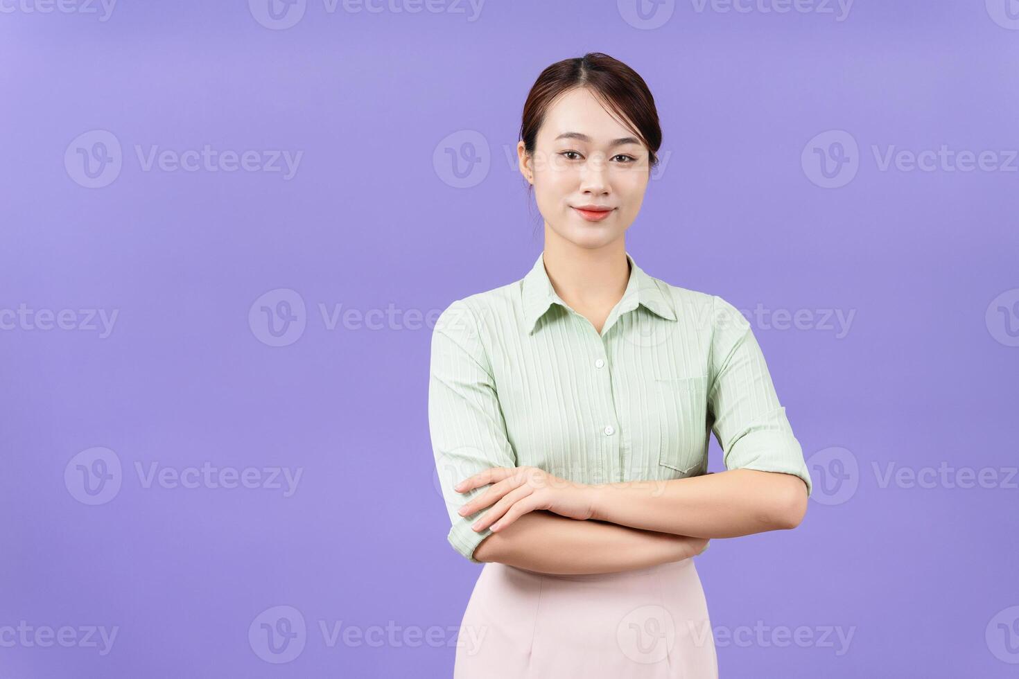 Photo of young Asian woman on purple background
