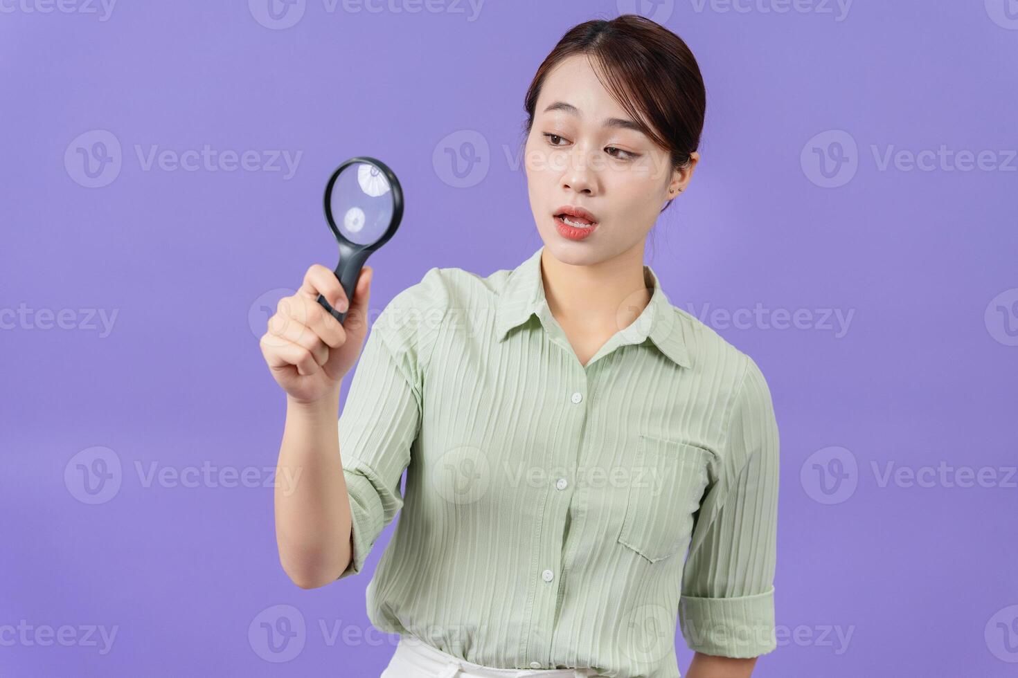 Photo of young Asian woman on purple background