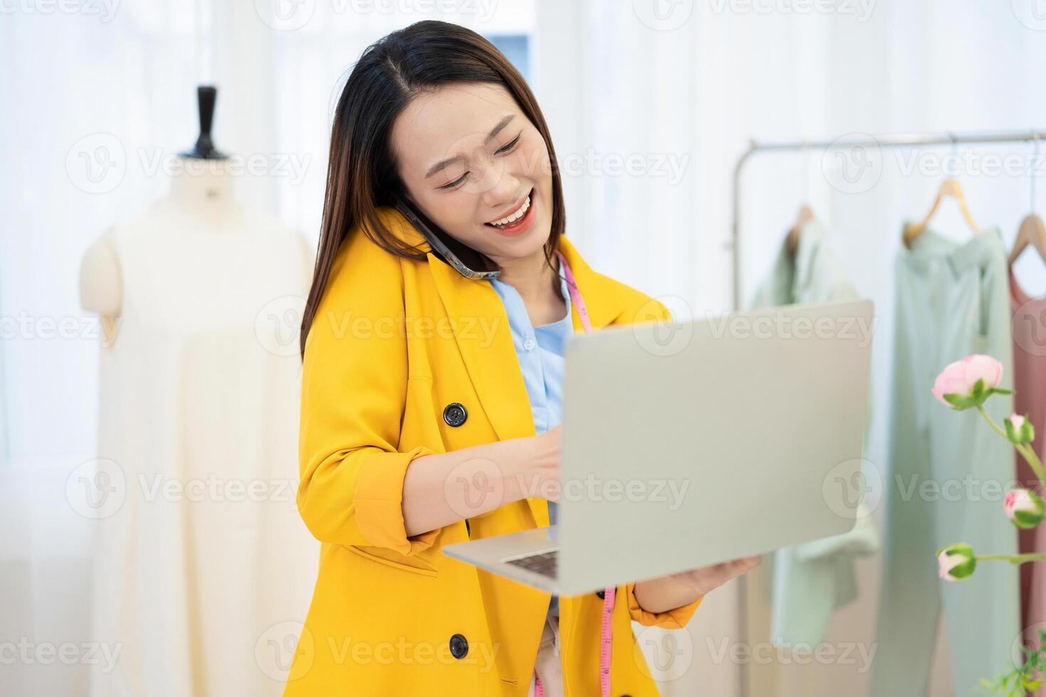 Photo of young Asian female fashion designer