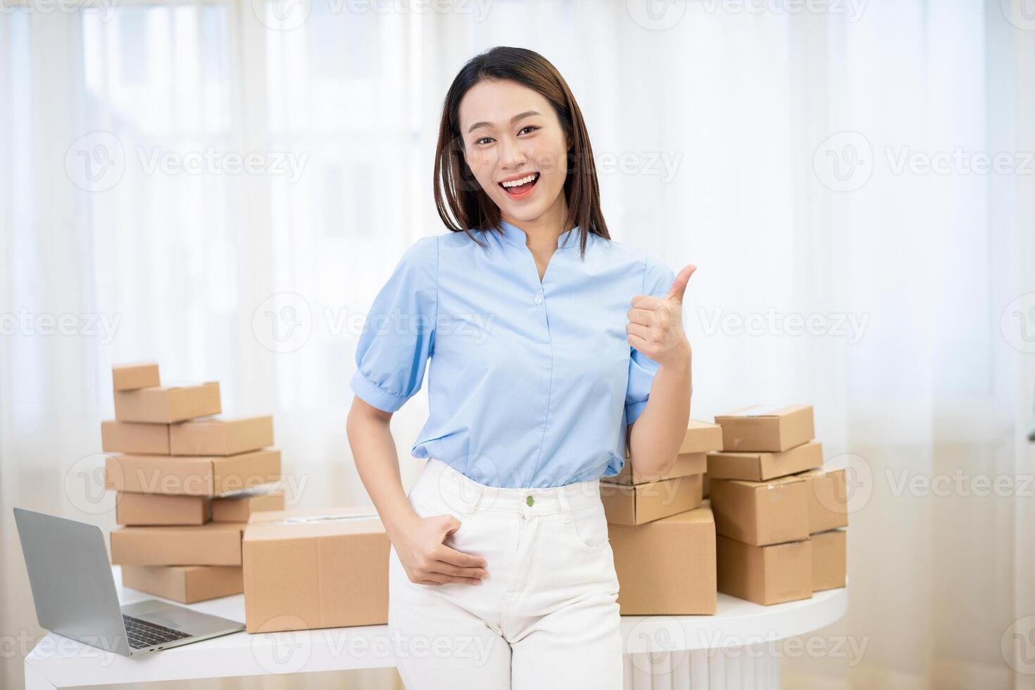Photo of young Asian woman selling online
