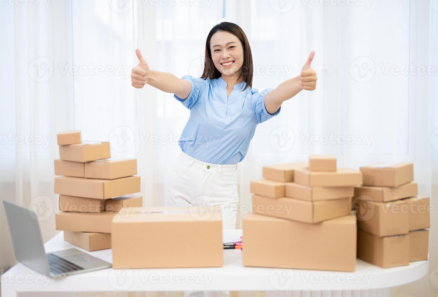 Photo of young Asian woman selling online