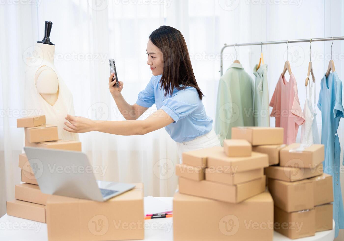 Photo of young Asian woman selling online