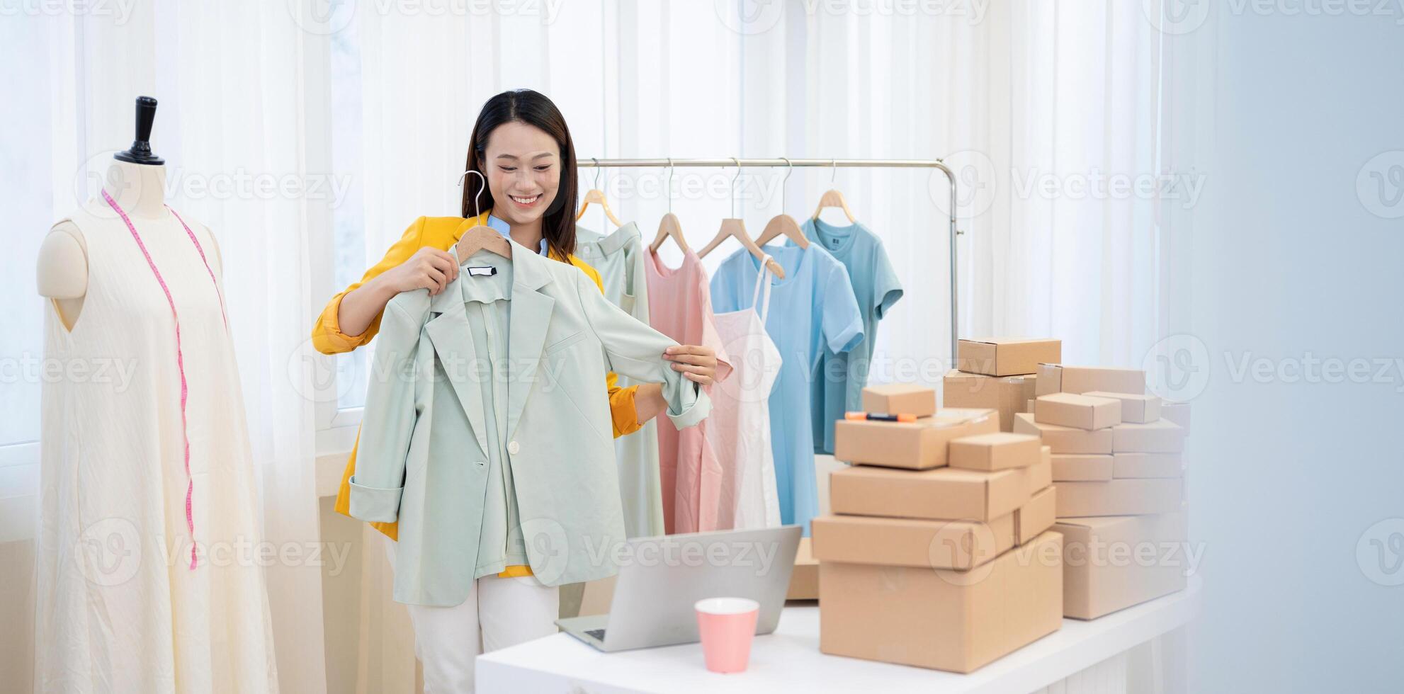 Photo of young Asian woman selling online