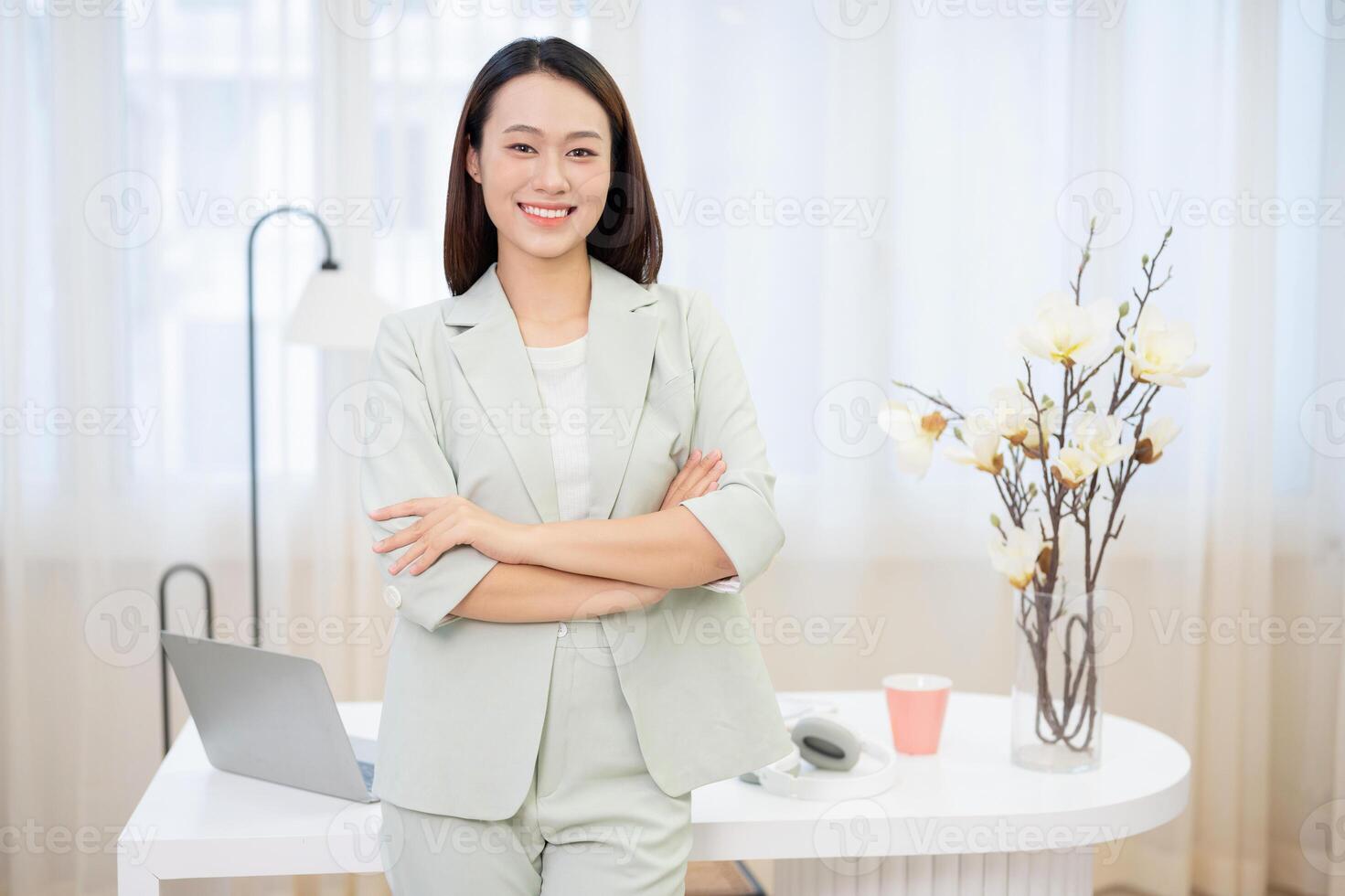 Young Asian businesswoman working at office photo