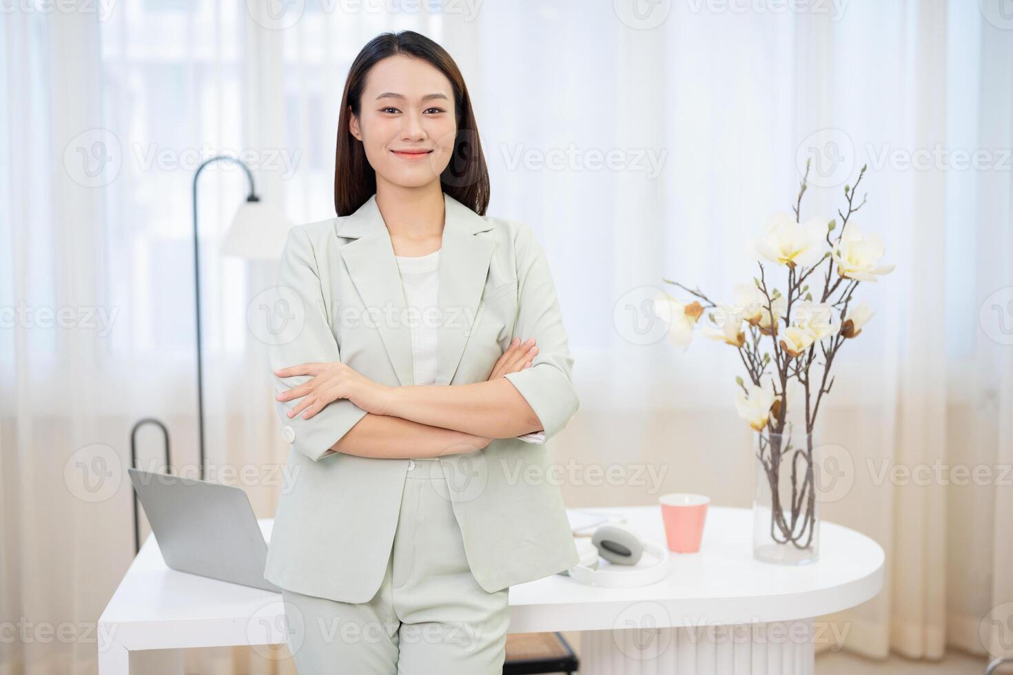 Young Asian businesswoman working at office photo
