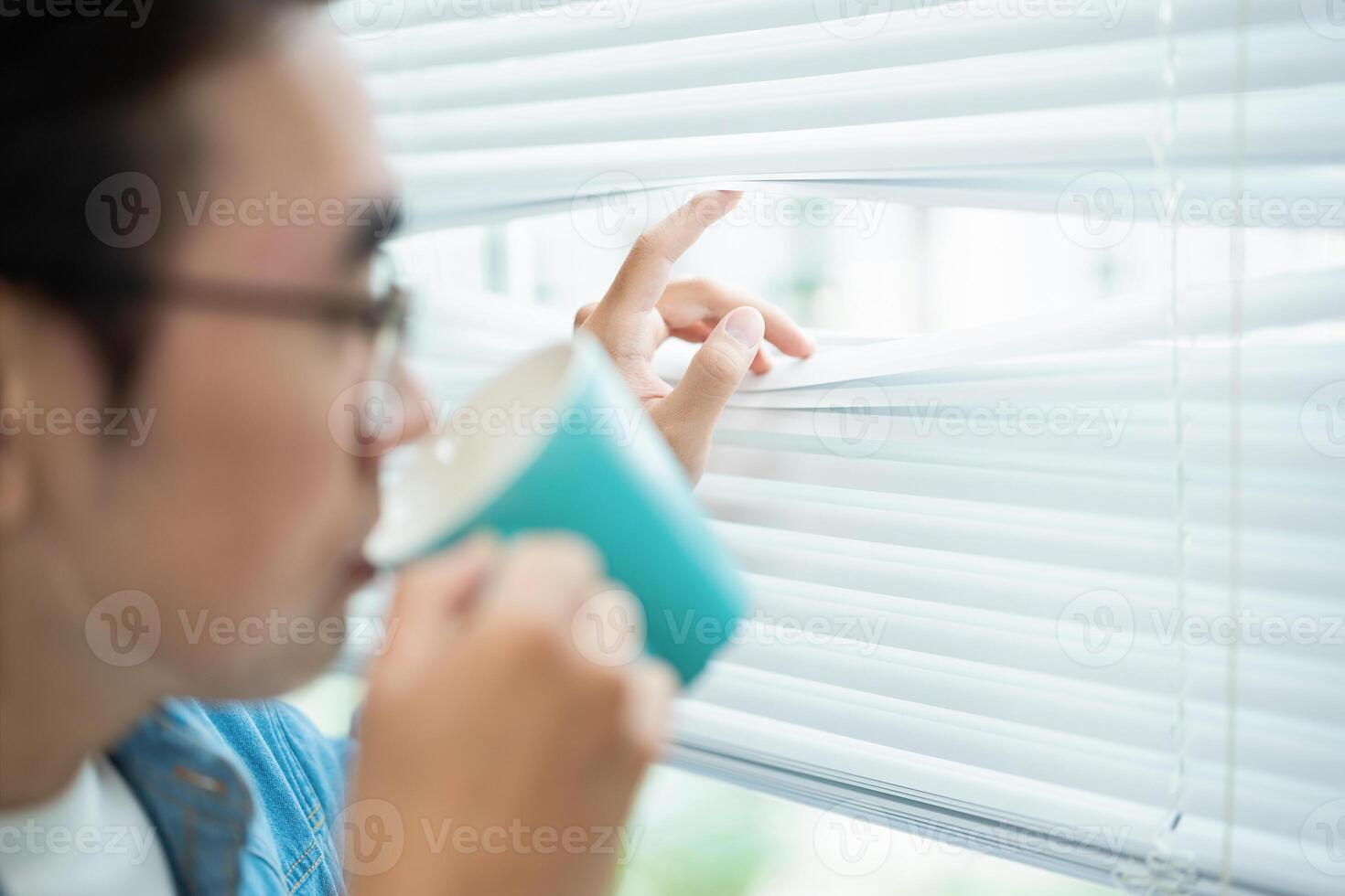 Photo of young Asian businessman at office