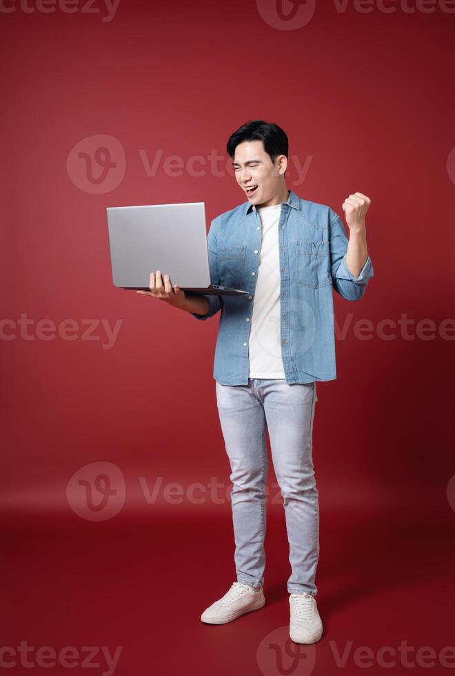 Photo of young Asian man on background
