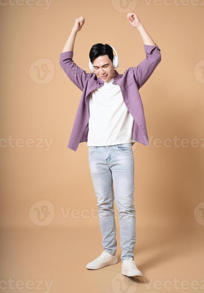 Photo of young Asian man on background