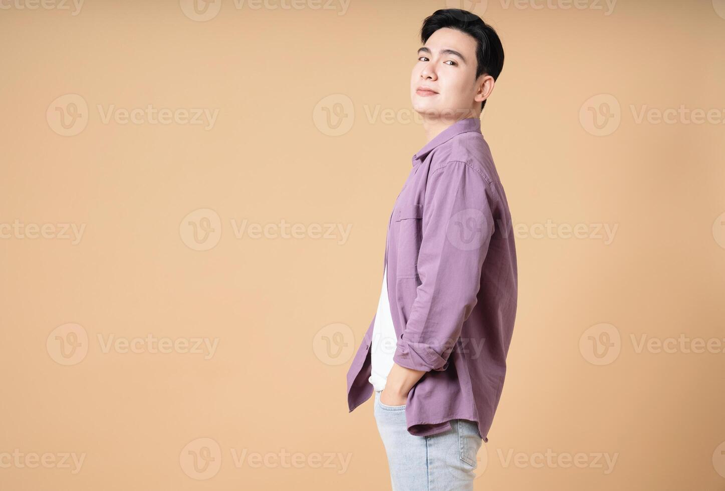 Photo of young Asian man on background