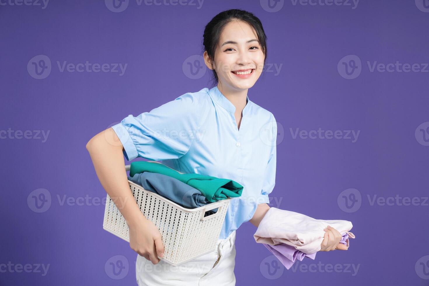 Image of young Asian woman on background photo