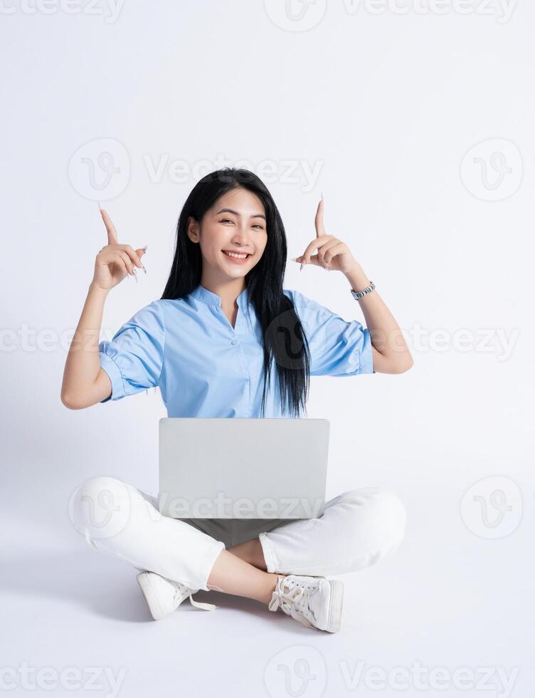 Photo of young Asian girl on white background