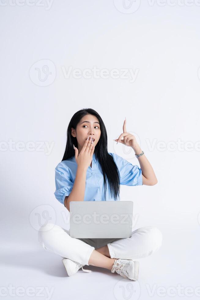 Photo of young Asian girl on white background