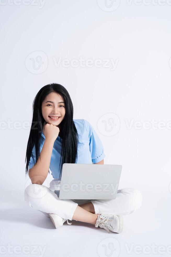 Photo of young Asian girl on white background