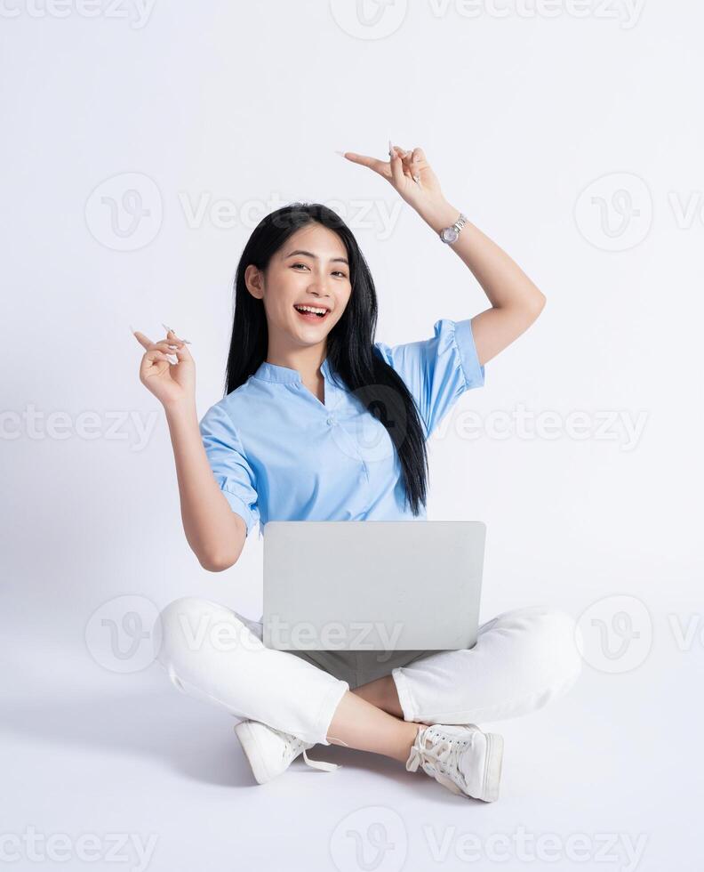 Photo of young Asian girl on white background