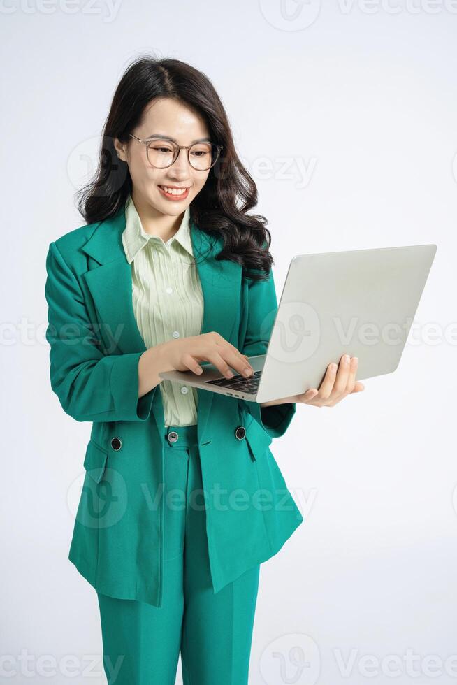 Image of young Asian business woman on background photo